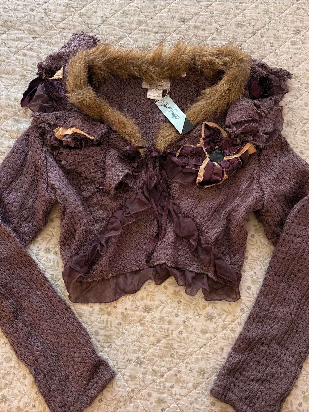 Aris. A vintage faux fur lilac knit bolero